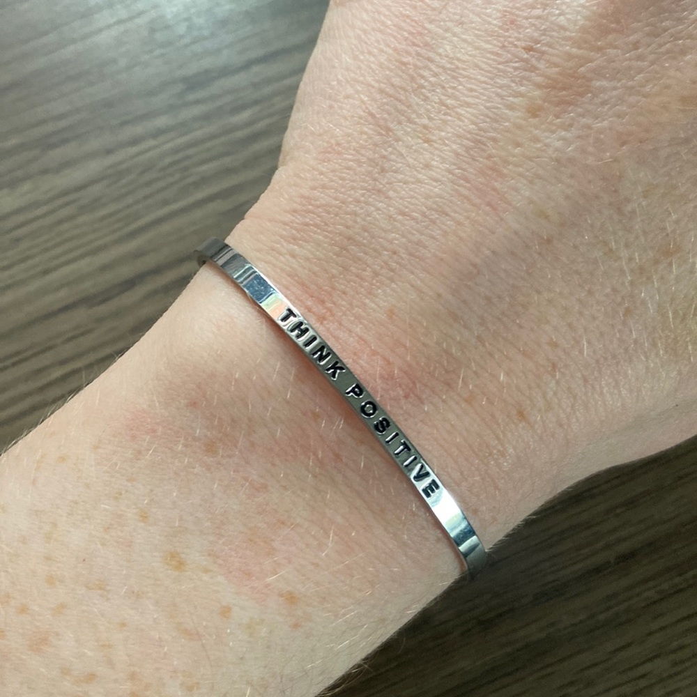 Mantraband in silver: think positive